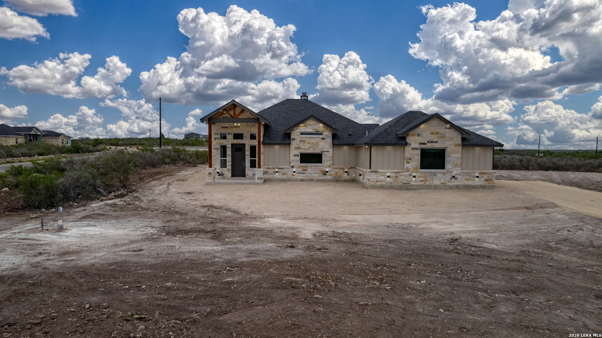 22 Greystone Hills Uvalde, TX 78801 - Photo 20 of 68 a view of a house with a yard