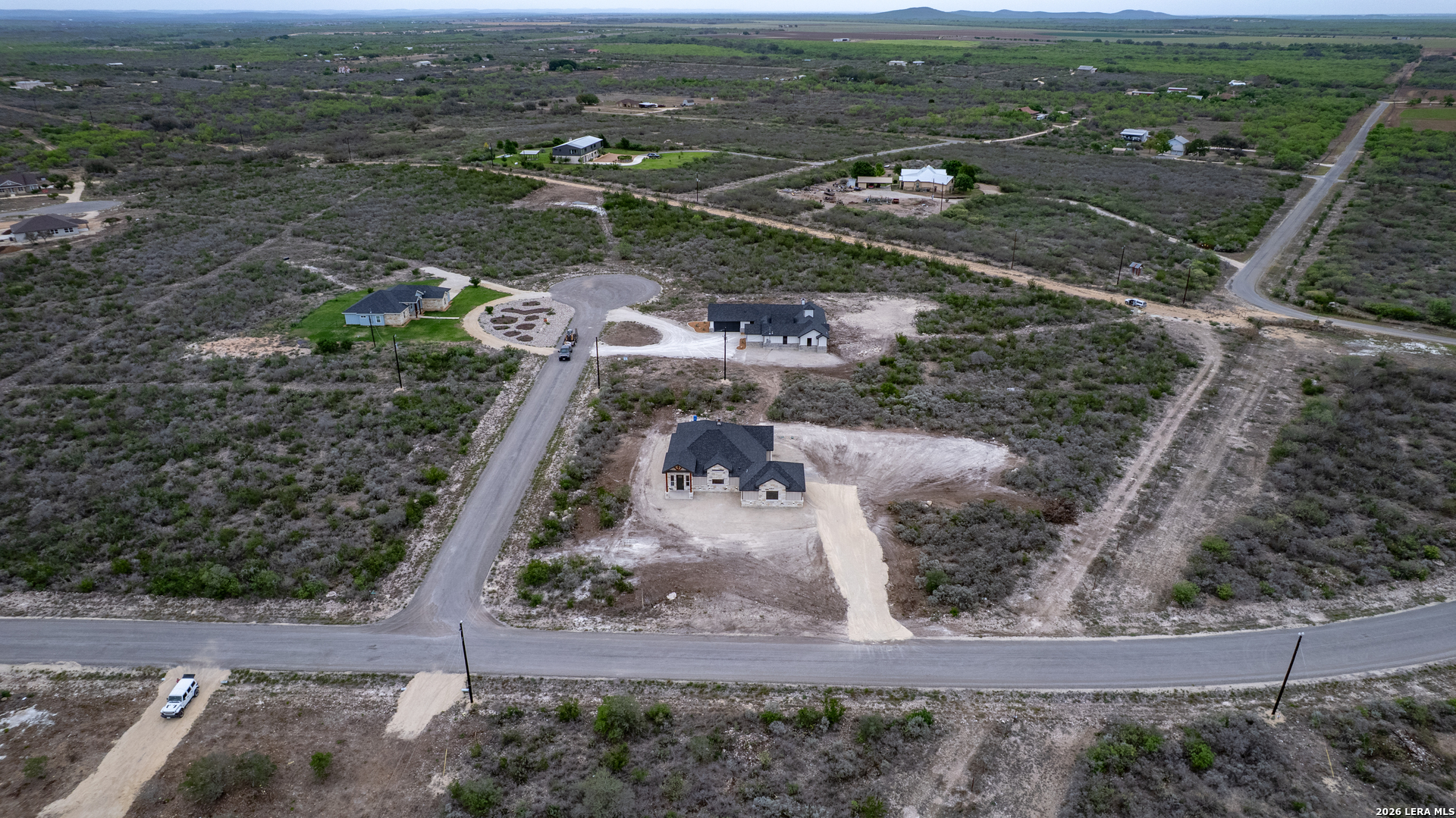 22 Greystone Hills Uvalde, TX 78801 - Photo 24 of 68 an aerial view of a house with a yard