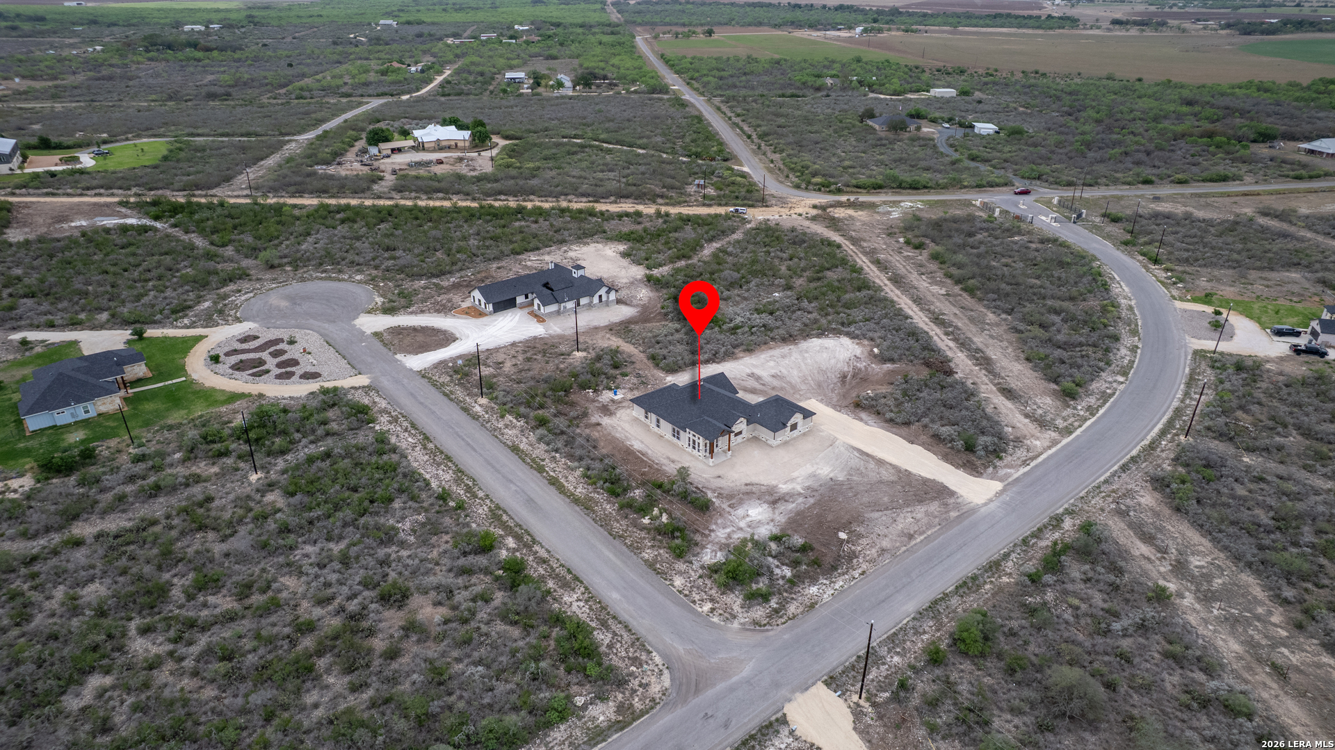 22 Greystone Hills Uvalde, TX 78801 - Photo 26 of 68 a view of a backyard with wooden fence