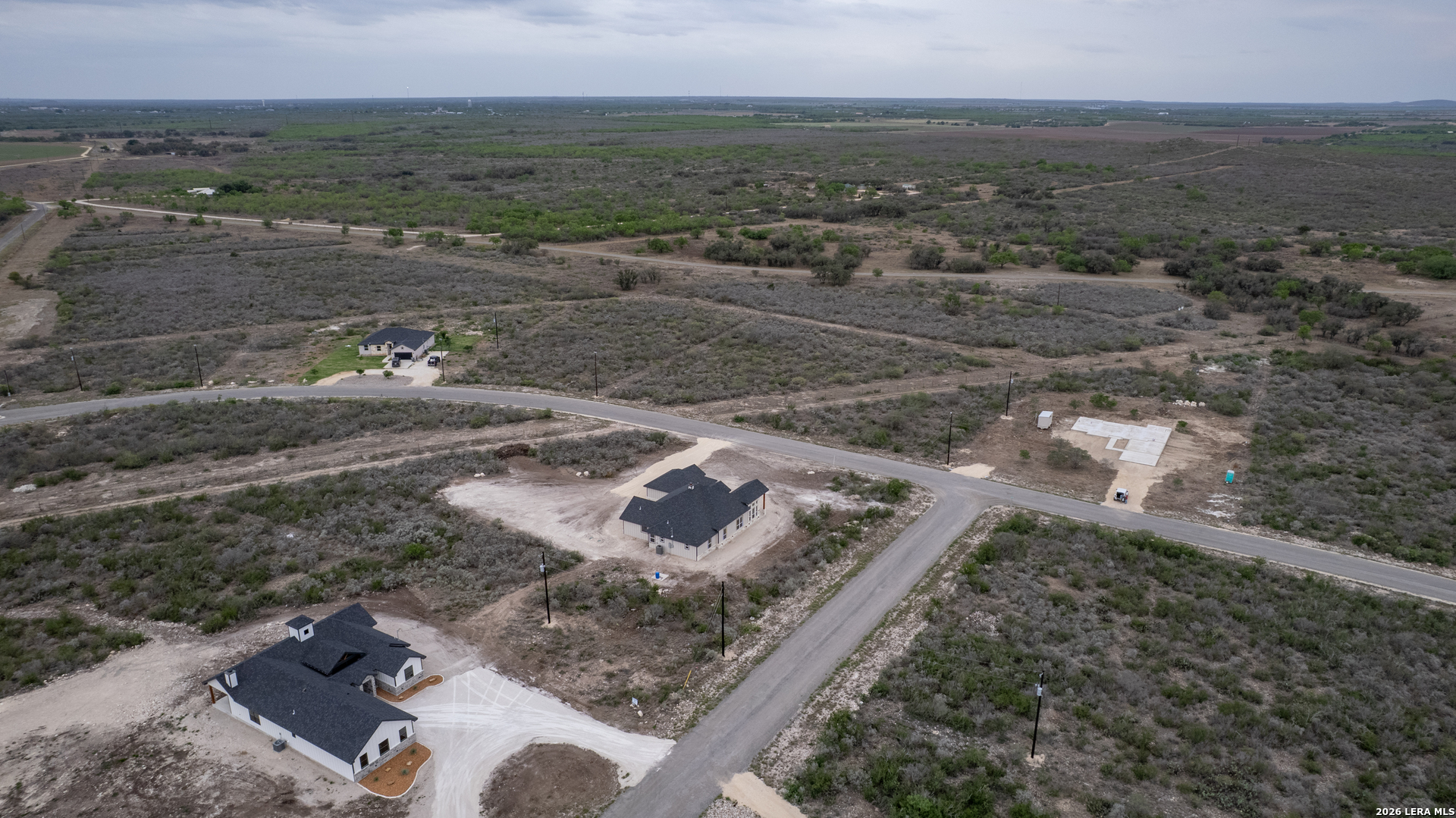 22 Greystone Hills Uvalde, TX 78801 - Photo 31 of 68 an aerial view of a house with a yard
