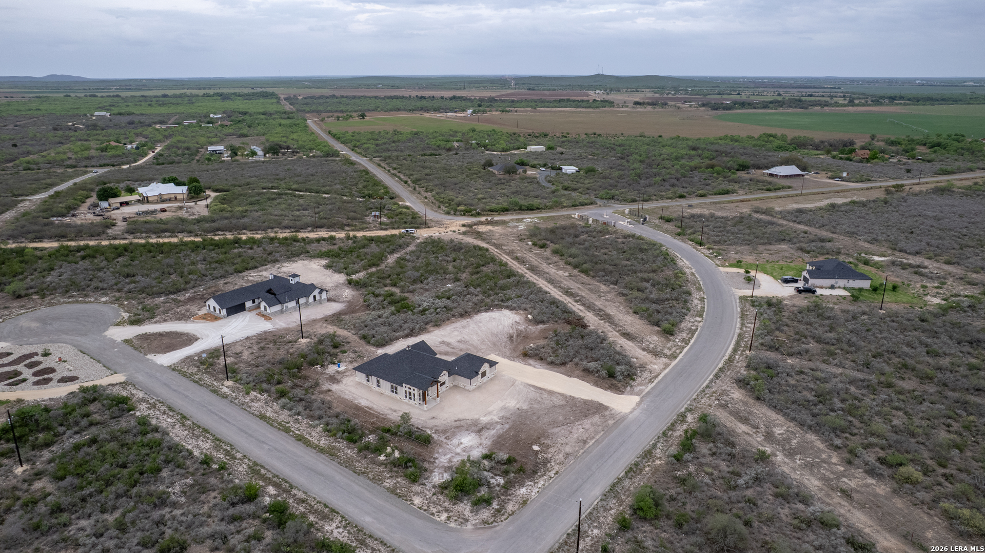22 Greystone Hills Uvalde, TX 78801 - Photo 34 of 68 an aerial view of a house with a yard