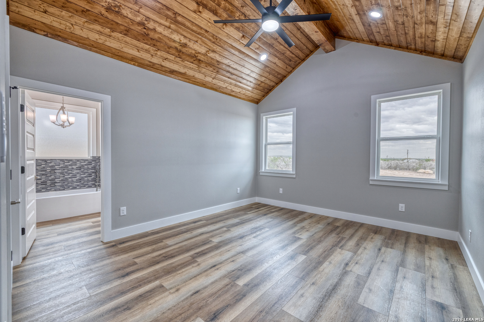 22 Greystone Hills Uvalde, TX 78801 - Photo 53 of 68 a view of room with window and wooden floor