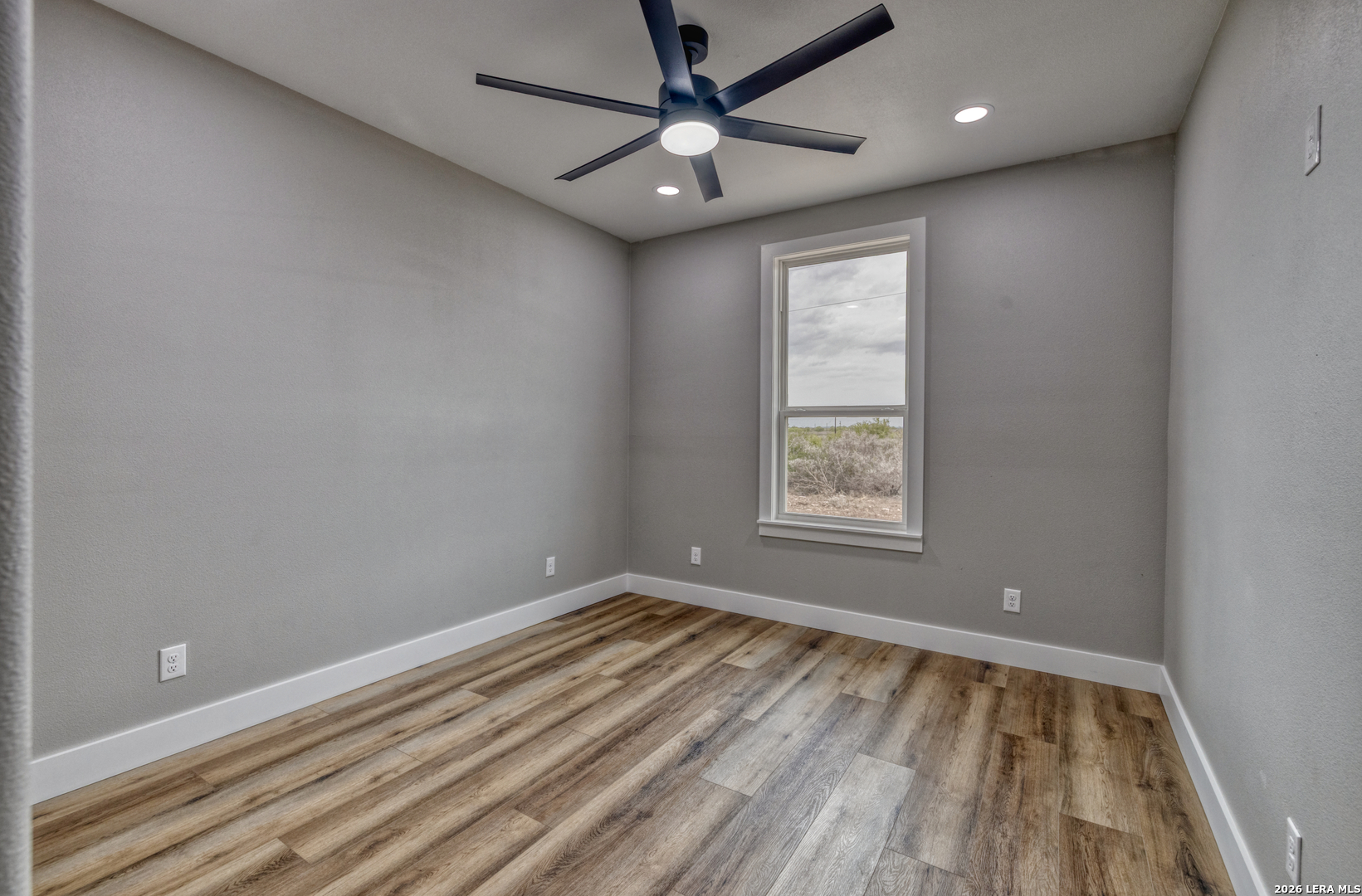 22 Greystone Hills Uvalde, TX 78801 - Photo 62 of 68 a view of room with window and ceiling fan