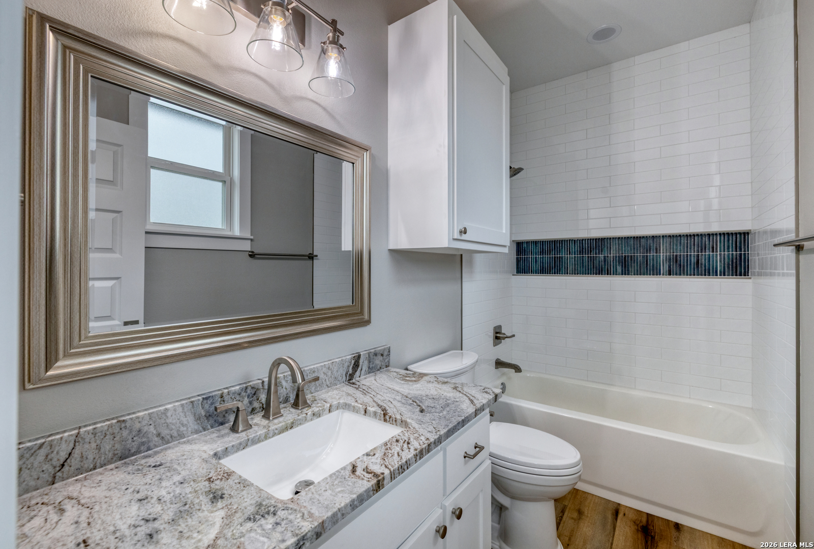 22 Greystone Hills Uvalde, TX 78801 - Photo 64 of 68 a bathroom with a granite countertop sink toilet and shower