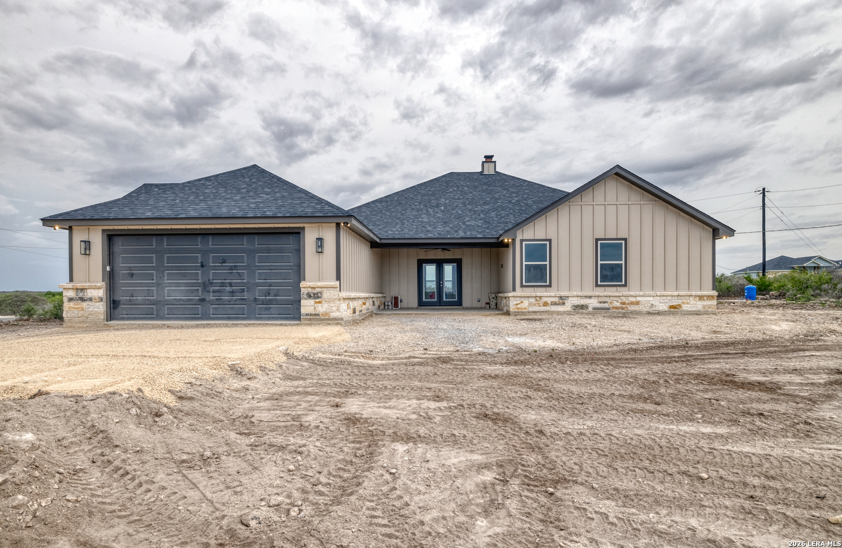 22 Greystone Hills Uvalde, TX 78801 - Photo 8 of 68 a front view of a house with a garden