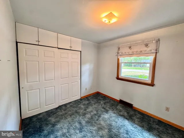 a view of a refrigerator in kitchen