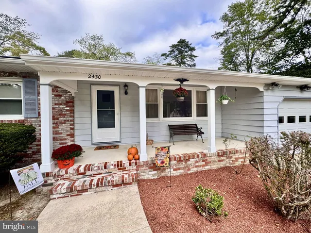 front view of a house with a patio