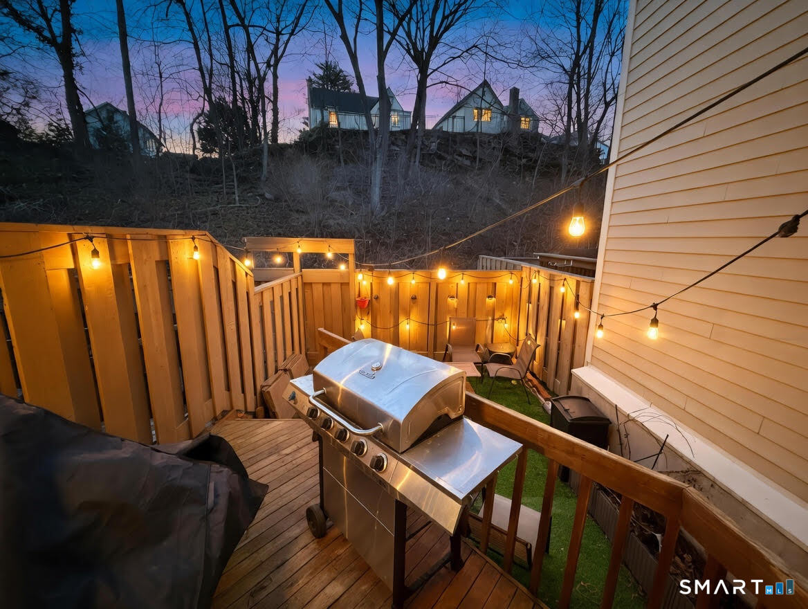 14 Sunrise Hill Road, Unit 14 Norwalk, CT 06851 - Photo 14 of 23 a patio with table and chairs
