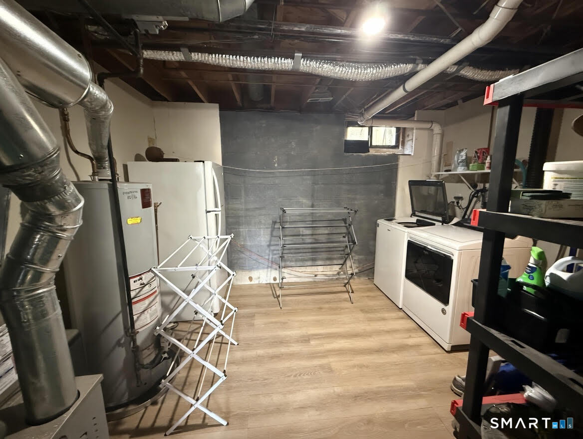 14 Sunrise Hill Road, Unit 14 Norwalk, CT 06851 - Photo 19 of 23 a room with gym equipment