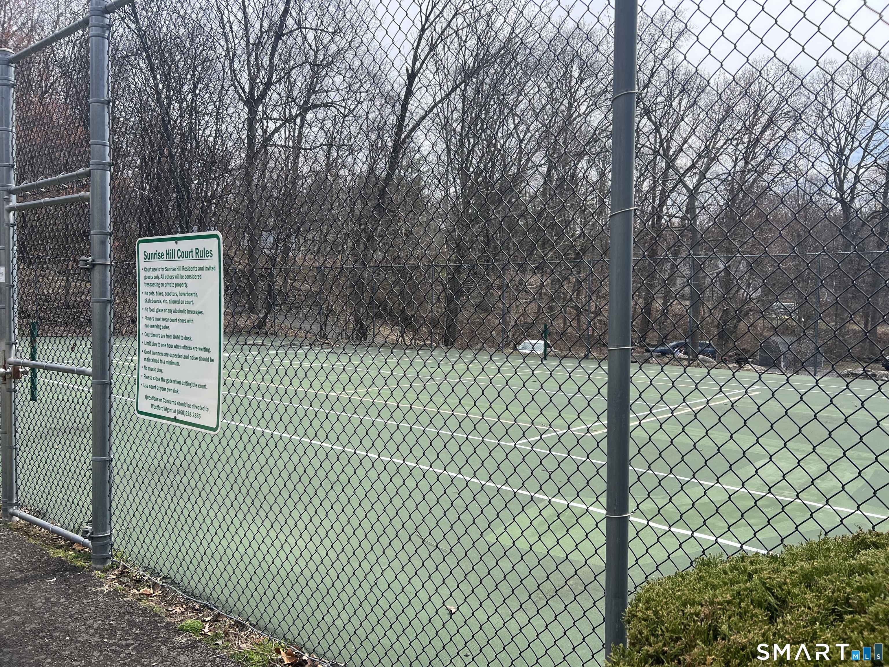 14 Sunrise Hill Road, Unit 14 Norwalk, CT 06851 - Photo 23 of 23 a sign on the side of a building