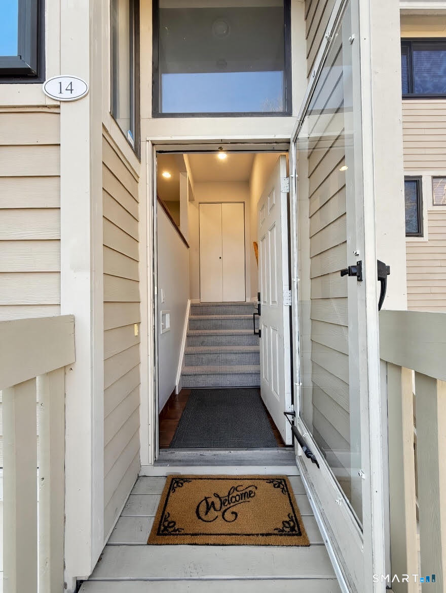 14 Sunrise Hill Road, Unit 14 Norwalk, CT 06851 - Photo 4 of 23 a view of a entryway door of the house