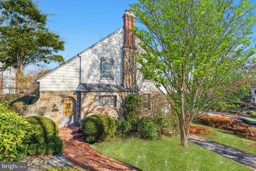 a view of a street with a building in the background