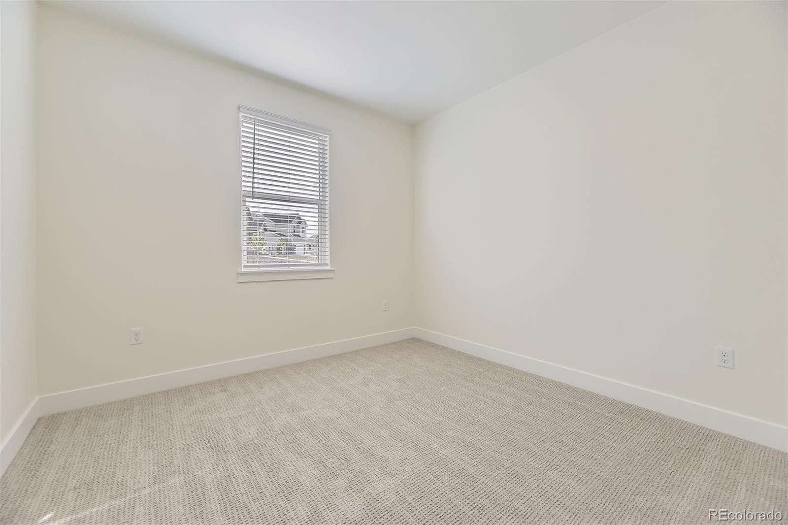 42979 Colonial Trail Elizabeth, CO 80107 - Photo 21 of 32 an empty room with a window