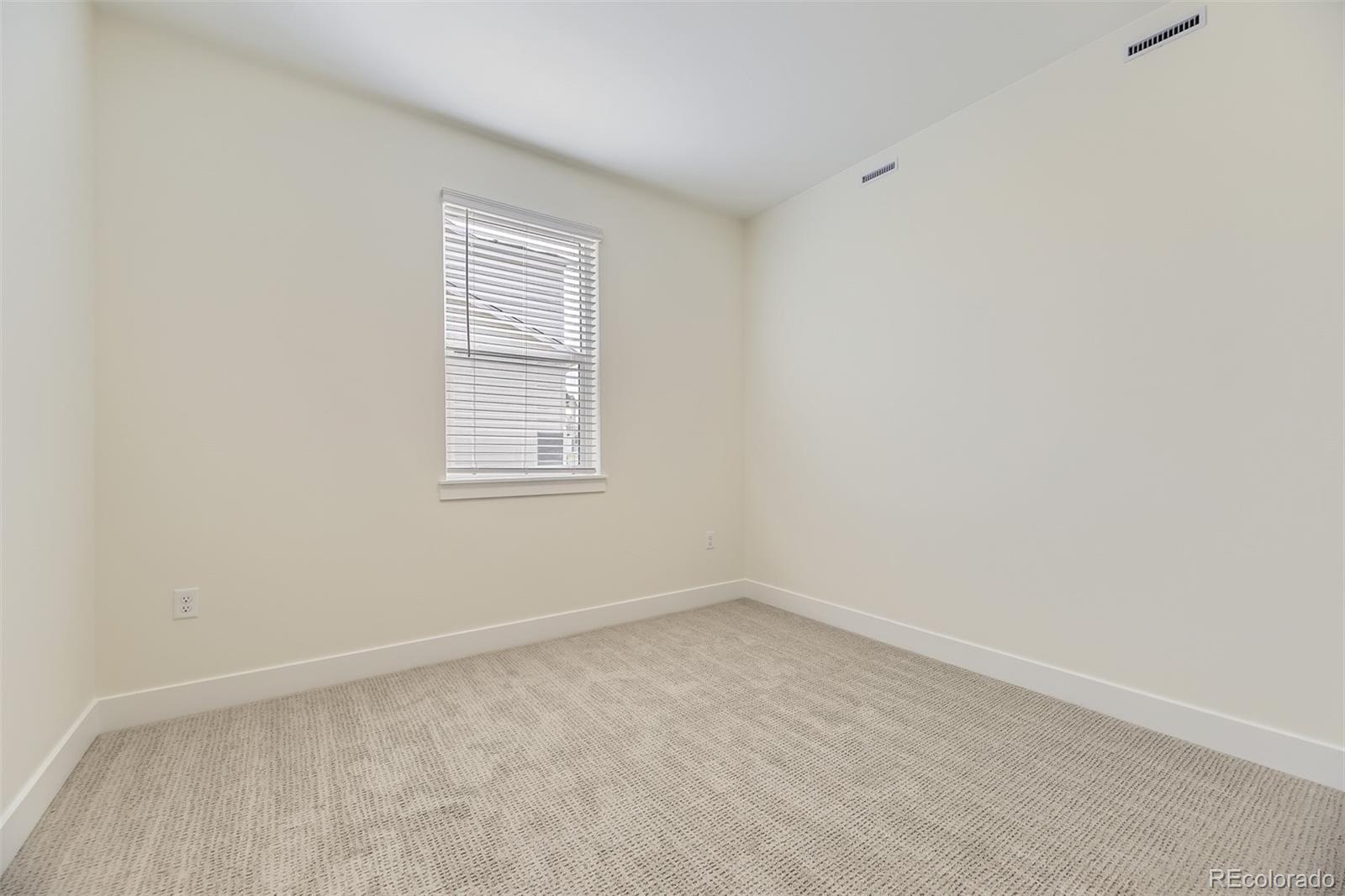 42979 Colonial Trail Elizabeth, CO 80107 - Photo 22 of 32 an empty room with a window