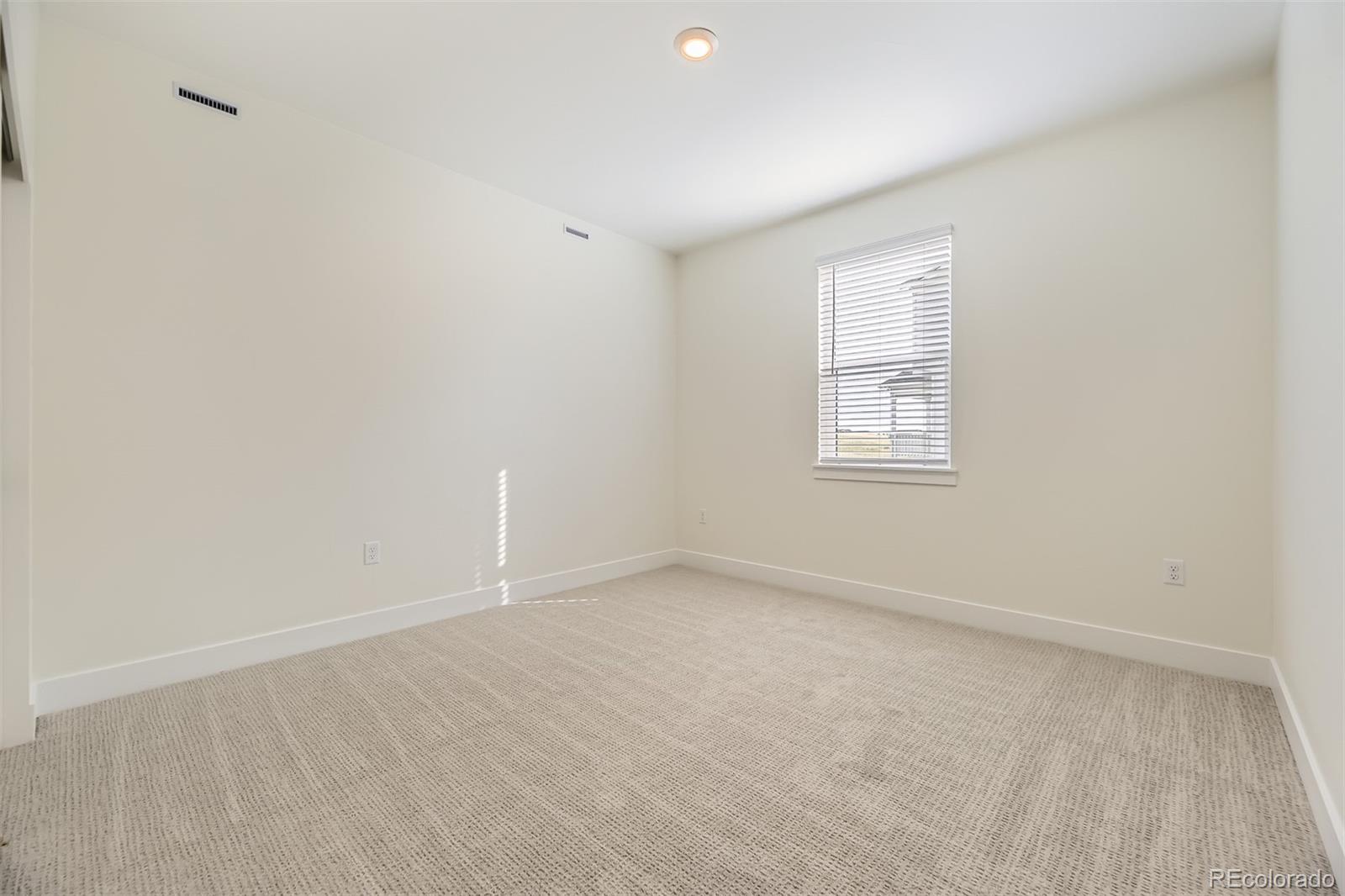 42979 Colonial Trail Elizabeth, CO 80107 - Photo 23 of 32 an empty room with windows