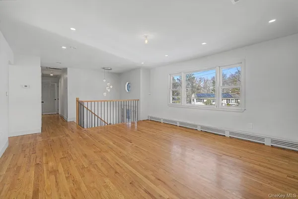 a kitchen with a refrigerator and a sink