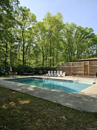 a view of a golf course with a lake