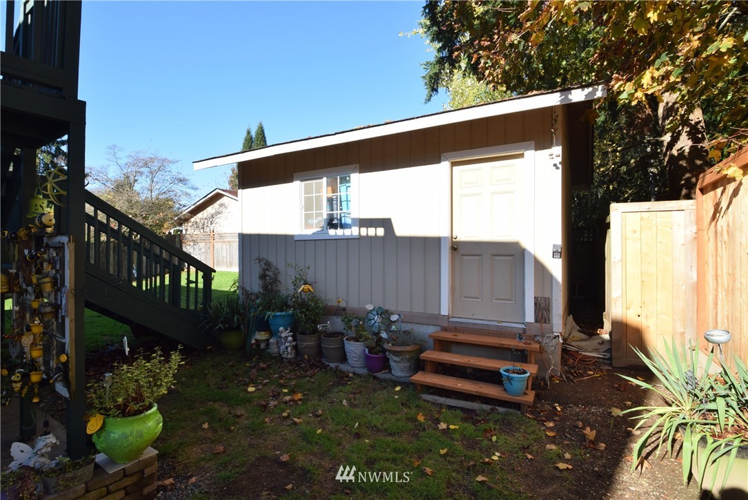 2631 166th Street Southeast Bothell, WA 98012 - Photo 16 of 18 a view of a two chairs in the patio