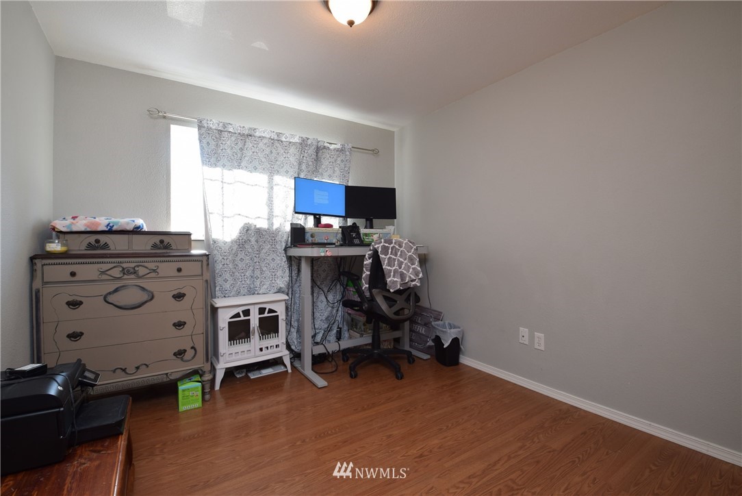 2631 166th Street Southeast Bothell, WA 98012 - Photo 9 of 18 a view of workspace with wooden floor