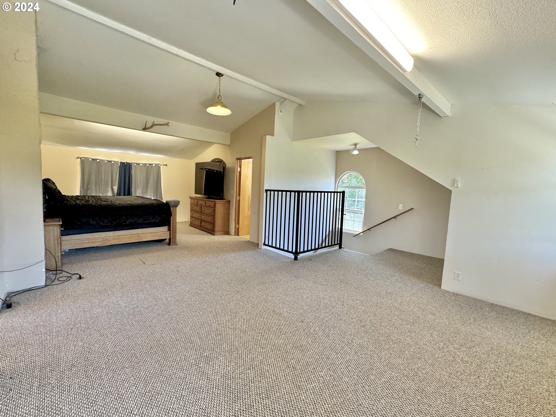 1463 Southside Road Sutherlin, OR 97479 - Photo 18 of 48 a view of a livingroom with furniture and a ceiling fan
