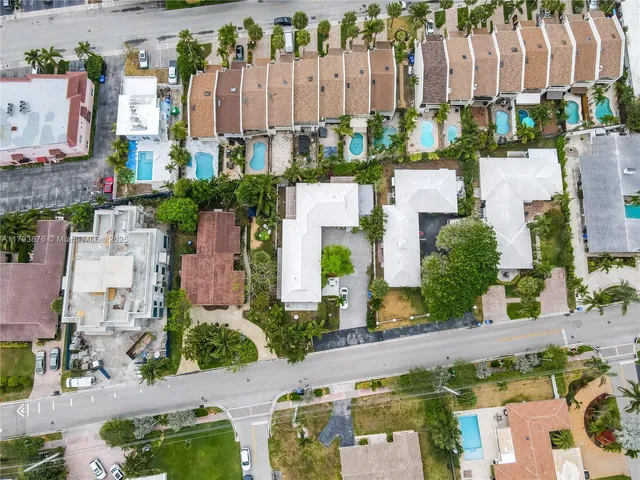 an aerial view of residential house with outdoor space