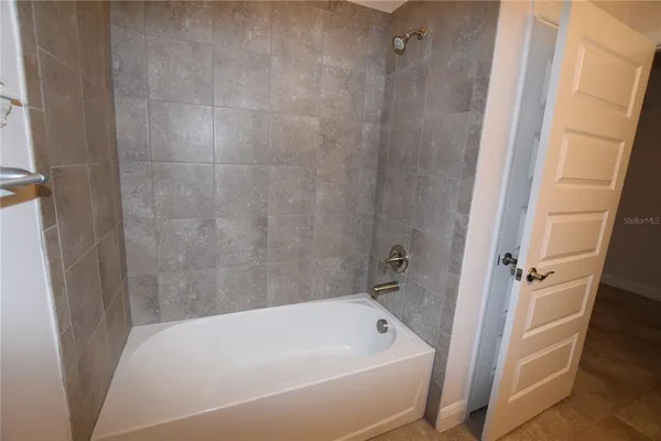 a bathroom with a bathtub