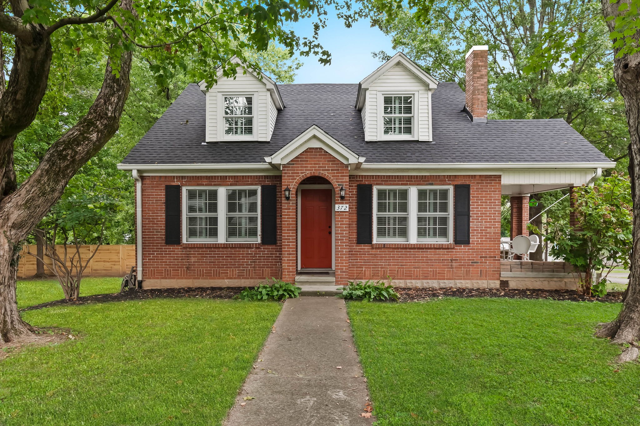 372 Perrolee Street Gallatin, TN 37066 - Photo 1 of 25 front view of a house with a yard