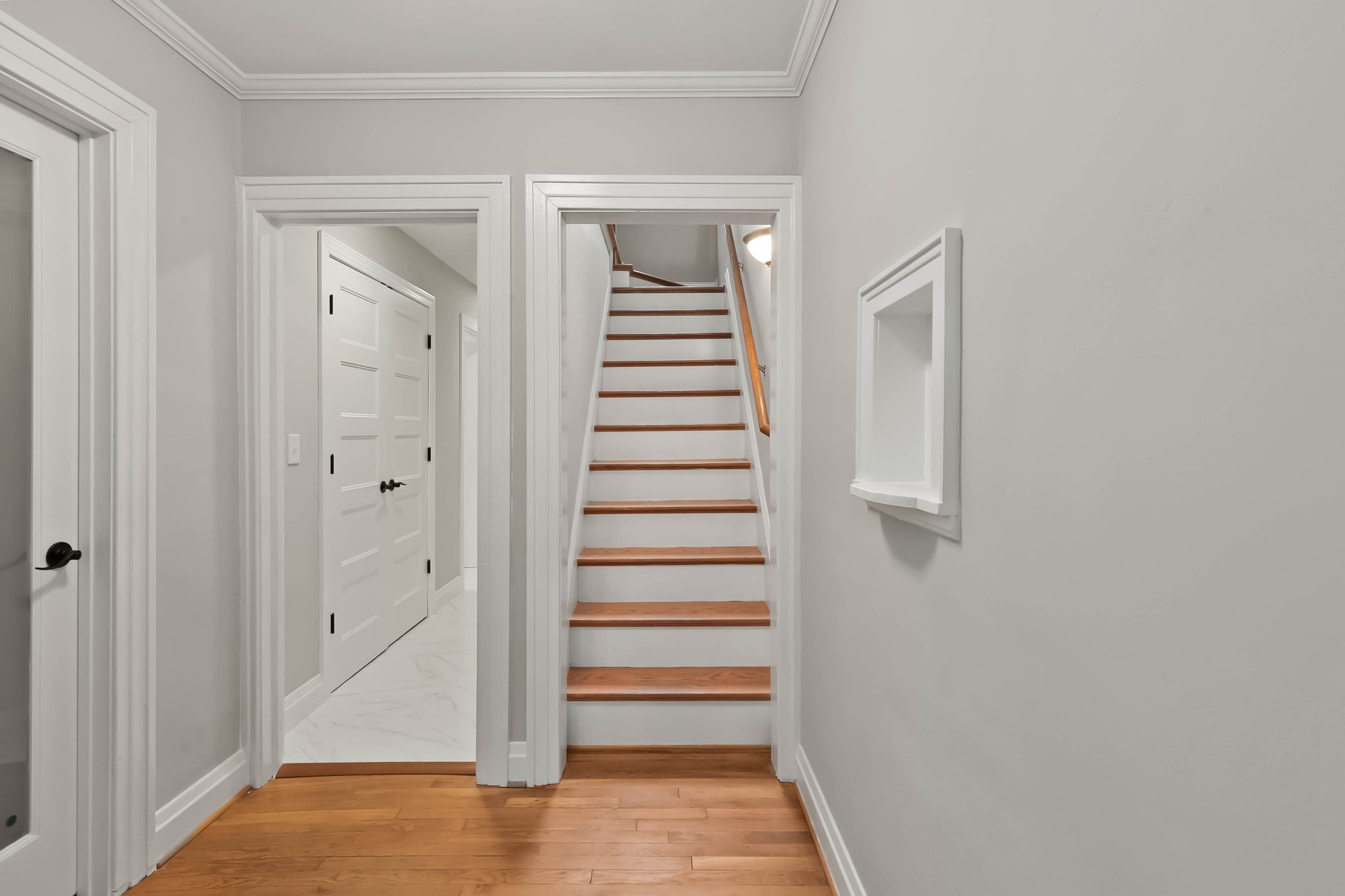 372 Perrolee Street Gallatin, TN 37066 - Photo 13 of 25 a view of a hallway with stairs and a door