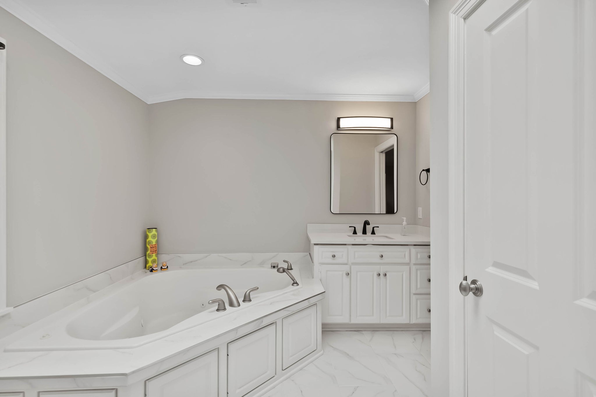 372 Perrolee Street Gallatin, TN 37066 - Photo 19 of 25 a bathroom with a sink vanity and tub
