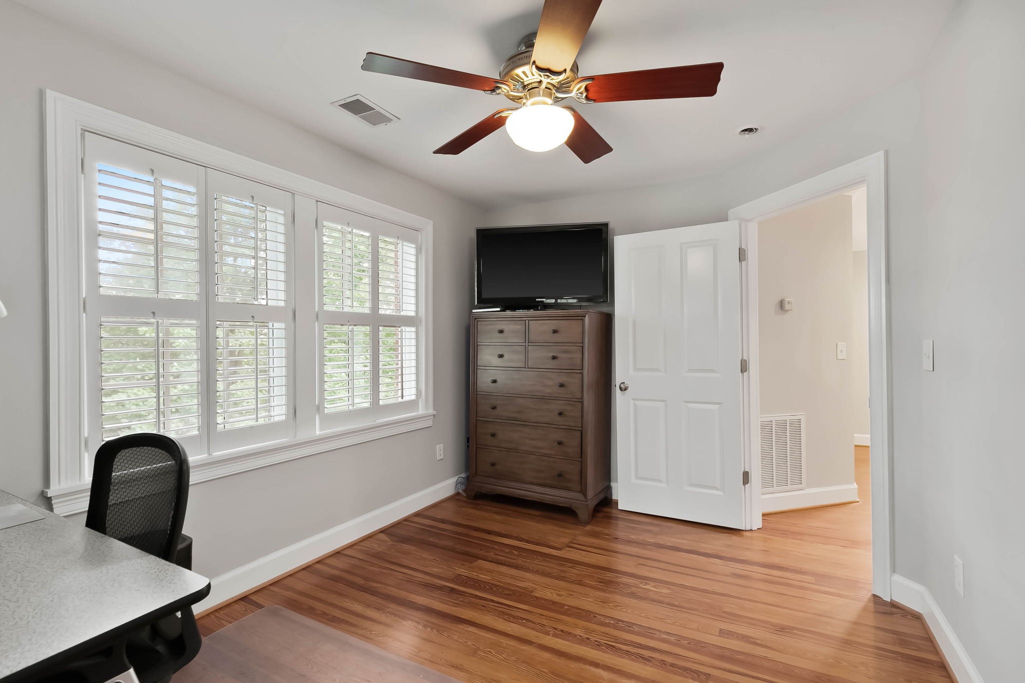 372 Perrolee Street Gallatin, TN 37066 - Photo 21 of 25 a view of livingroom with hardwood floor and a ceiling fan