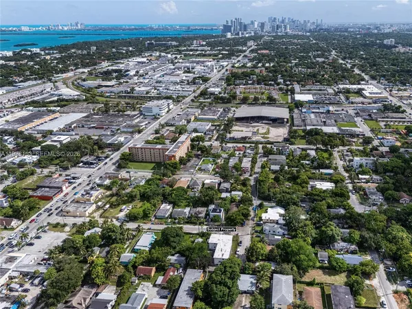 an aerial view of a city with lots of residential buildings