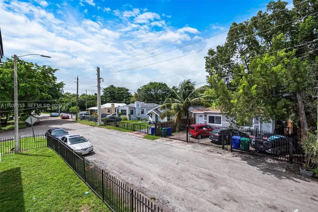 a view of an empty room with windows