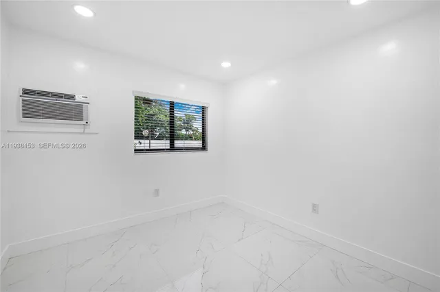 a kitchen with a sink and a window