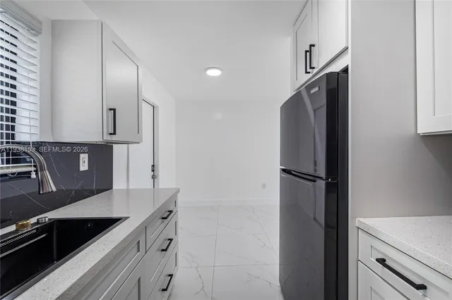 a close up of a stove top oven sitting inside of a kitchen
