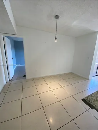 a view of a livingroom with white doors