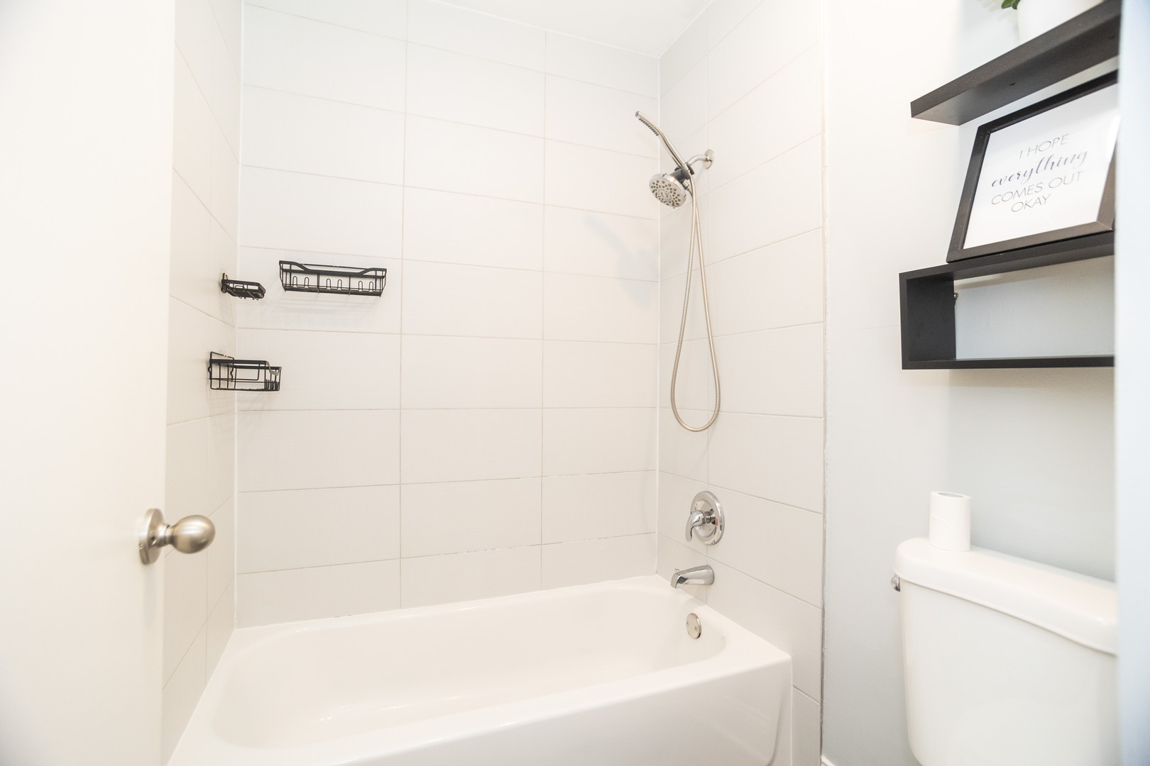 14451 South Ravinia Avenue, Unit 1 Orland Park, IL 60462 - Photo 18 of 22 a bathroom with a bathtub and a shower