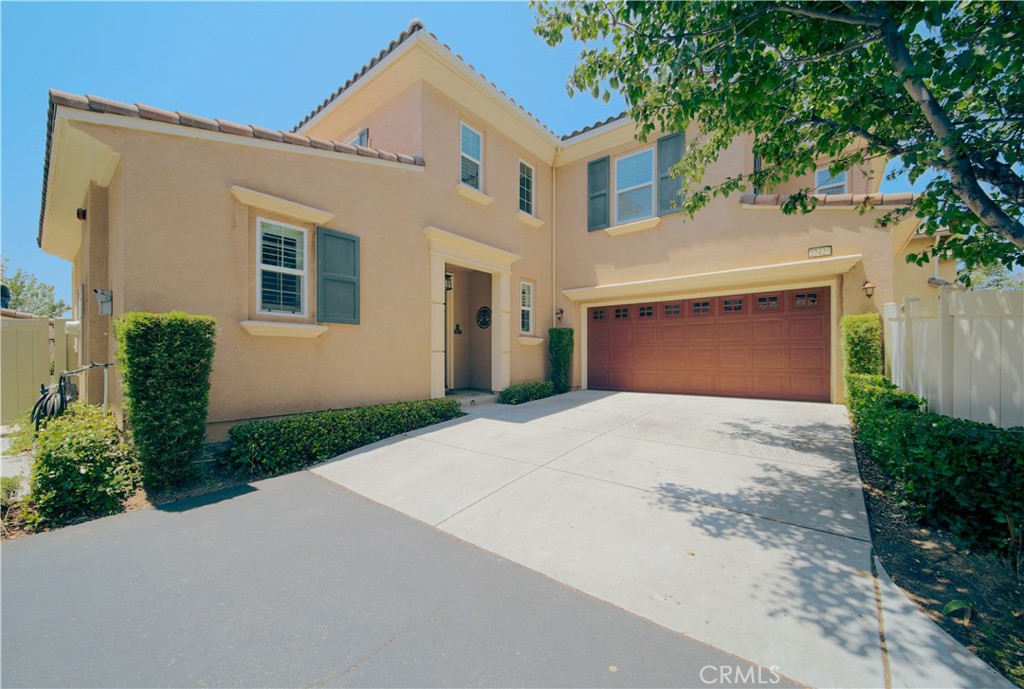 27425 Blackstone Road Temecula, CA 92591 - Photo 1 of 1 a front view of a house with a yard and garage
