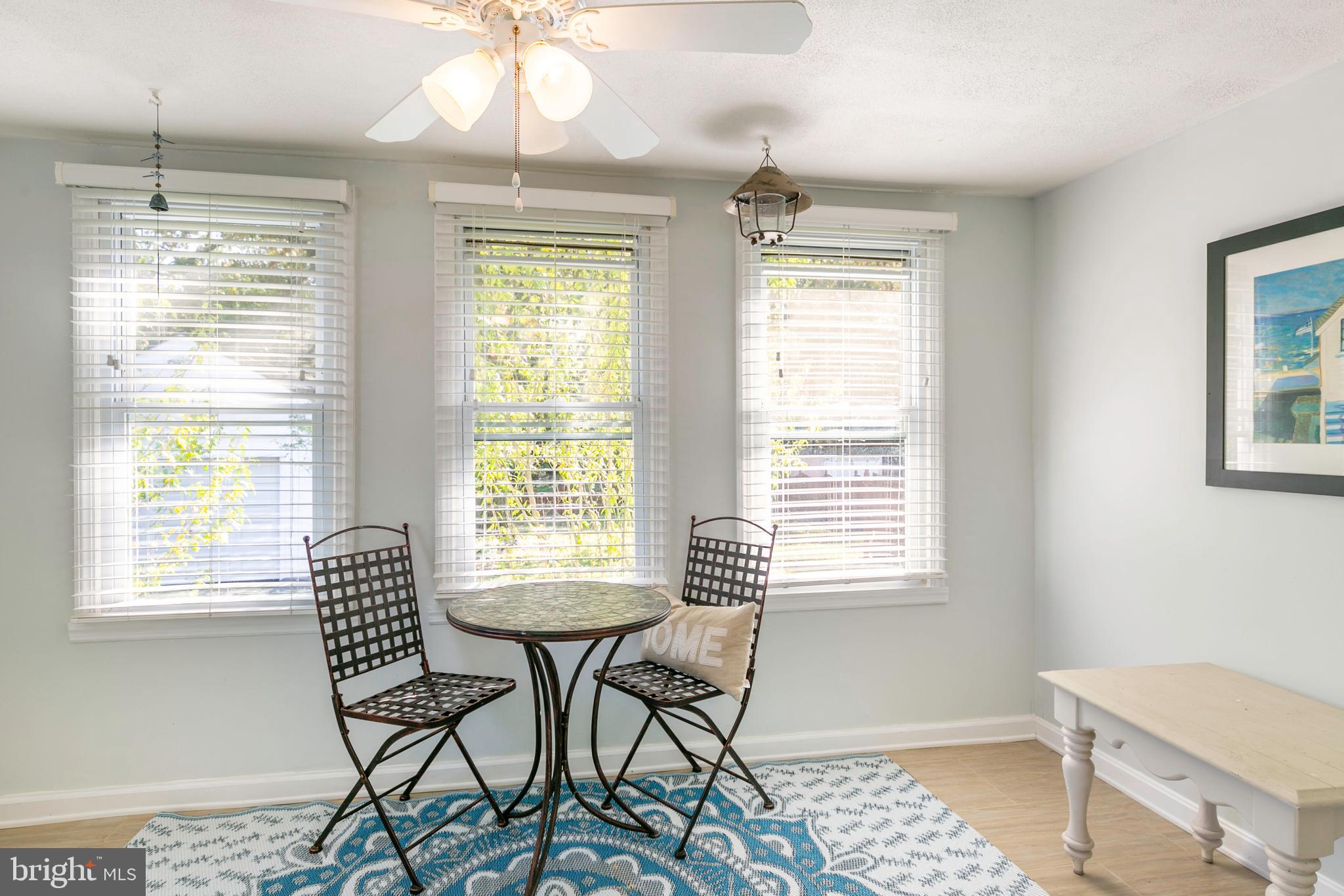 1595 Colony Road Pasadena, MD 21122 - Photo 13 of 57 Back sunroom is the spot to zen or work out