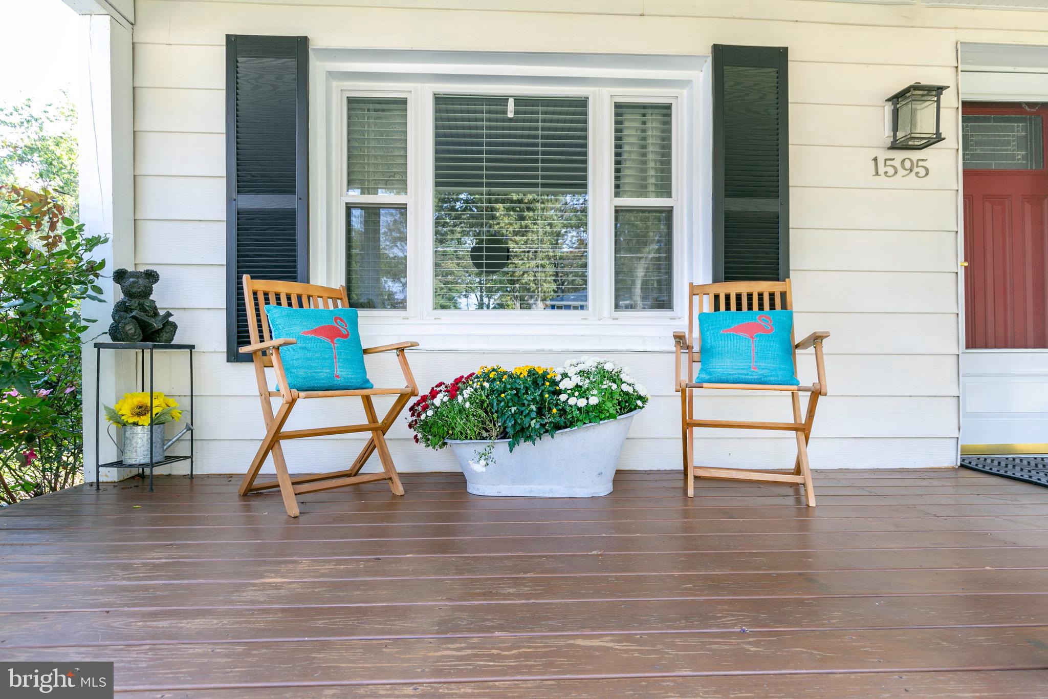 Seller added this incredible full front porch!