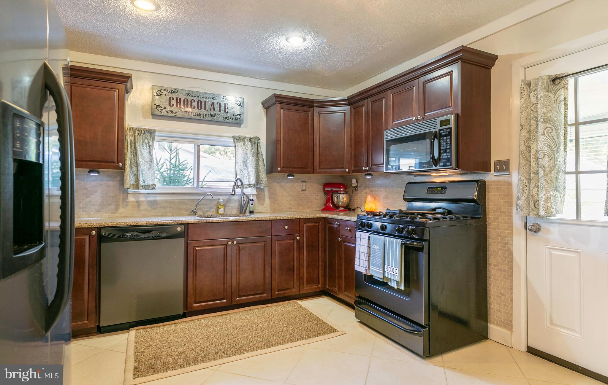 1595 Colony Road Pasadena, MD 21122 - Photo 21 of 57 Stainless steel appliances and new kitchen window