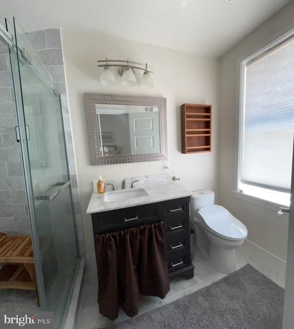 1230 Rhode Island Avenue Northeast Washington, DC 20018 - Photo 11 of 15 a bathroom with a sink toilet and mirror