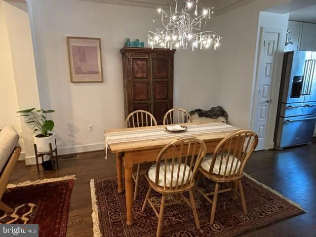 1230 Rhode Island Avenue Northeast Washington, DC 20018 - Photo 4 of 15 a view of a dining room with furniture and chandelier