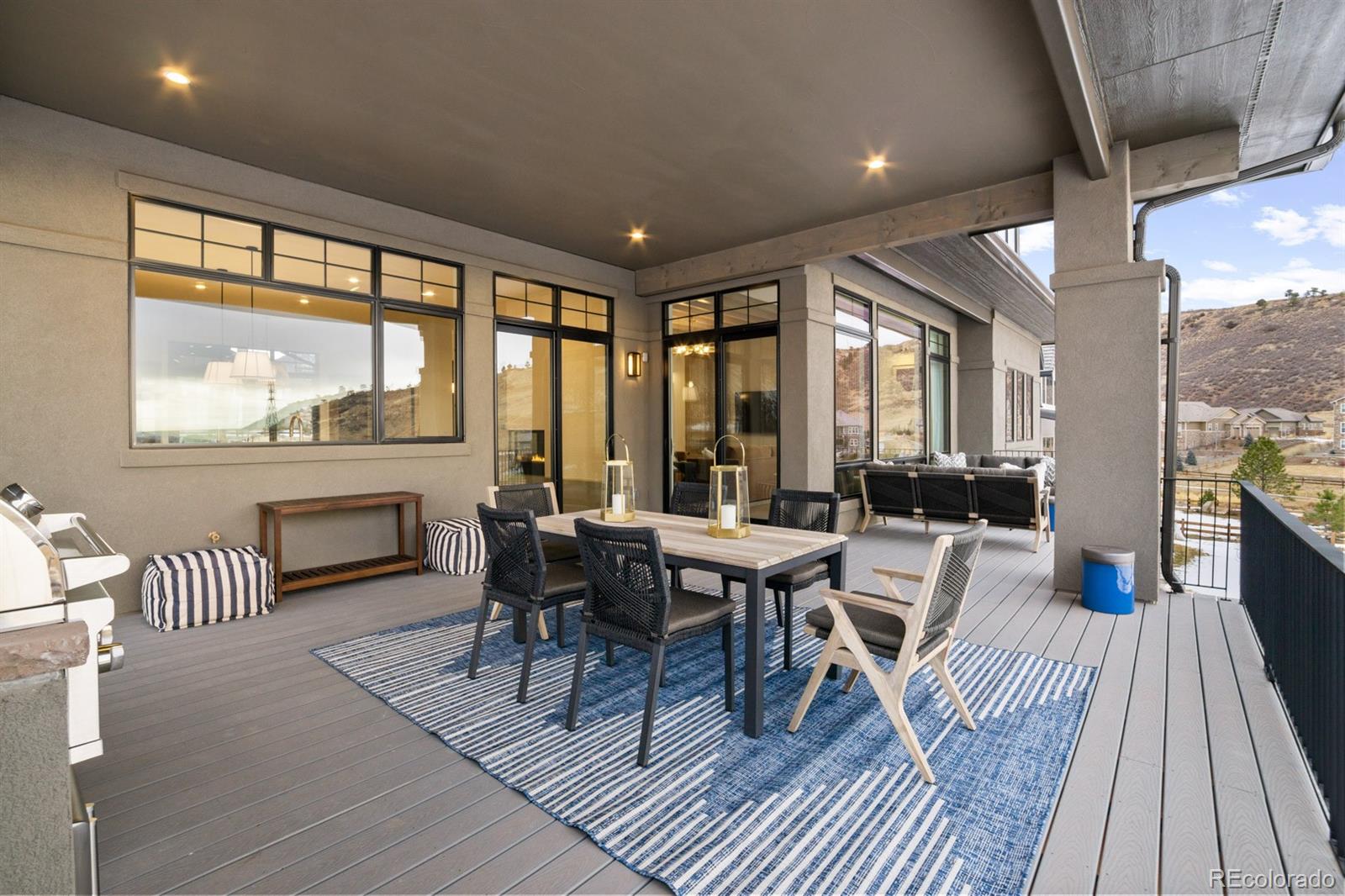 5132 Mount Glennon Way Morrison, CO 80465 - Photo 18 of 40 a view of a dining room with furniture window and wooden floor
