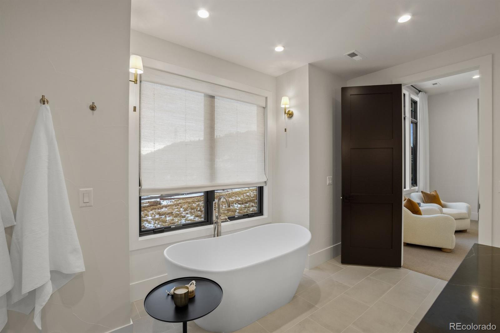 5132 Mount Glennon Way Morrison, CO 80465 - Photo 23 of 40 a bathroom with a sink and a mirror