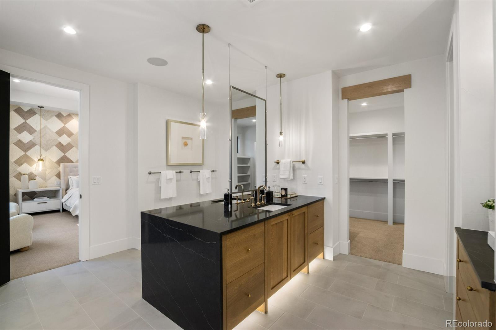 5132 Mount Glennon Way Morrison, CO 80465 - Photo 24 of 40 a kitchen with a sink and refrigerator
