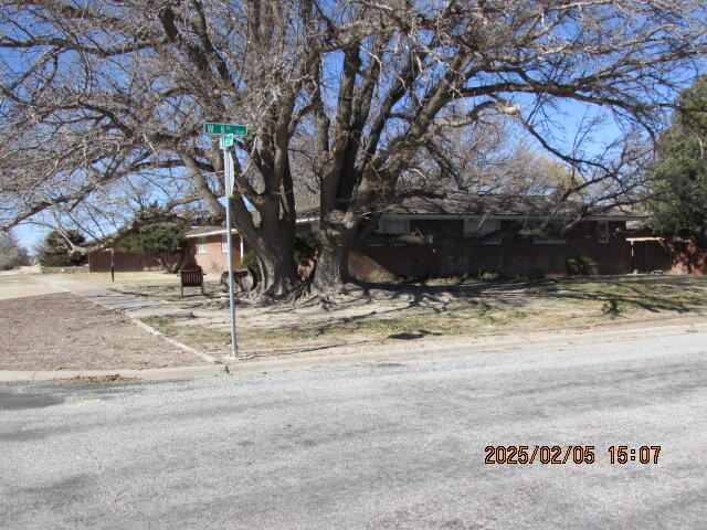608 West Ave J Muleshoe, TX 79347 - Photo 2 of 25 a view of a yard with snow on the road