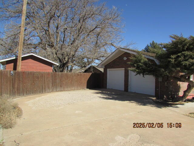 608 West Ave J Muleshoe, TX 79347 - Photo 3 of 25 a view of a house with a snow in the yard