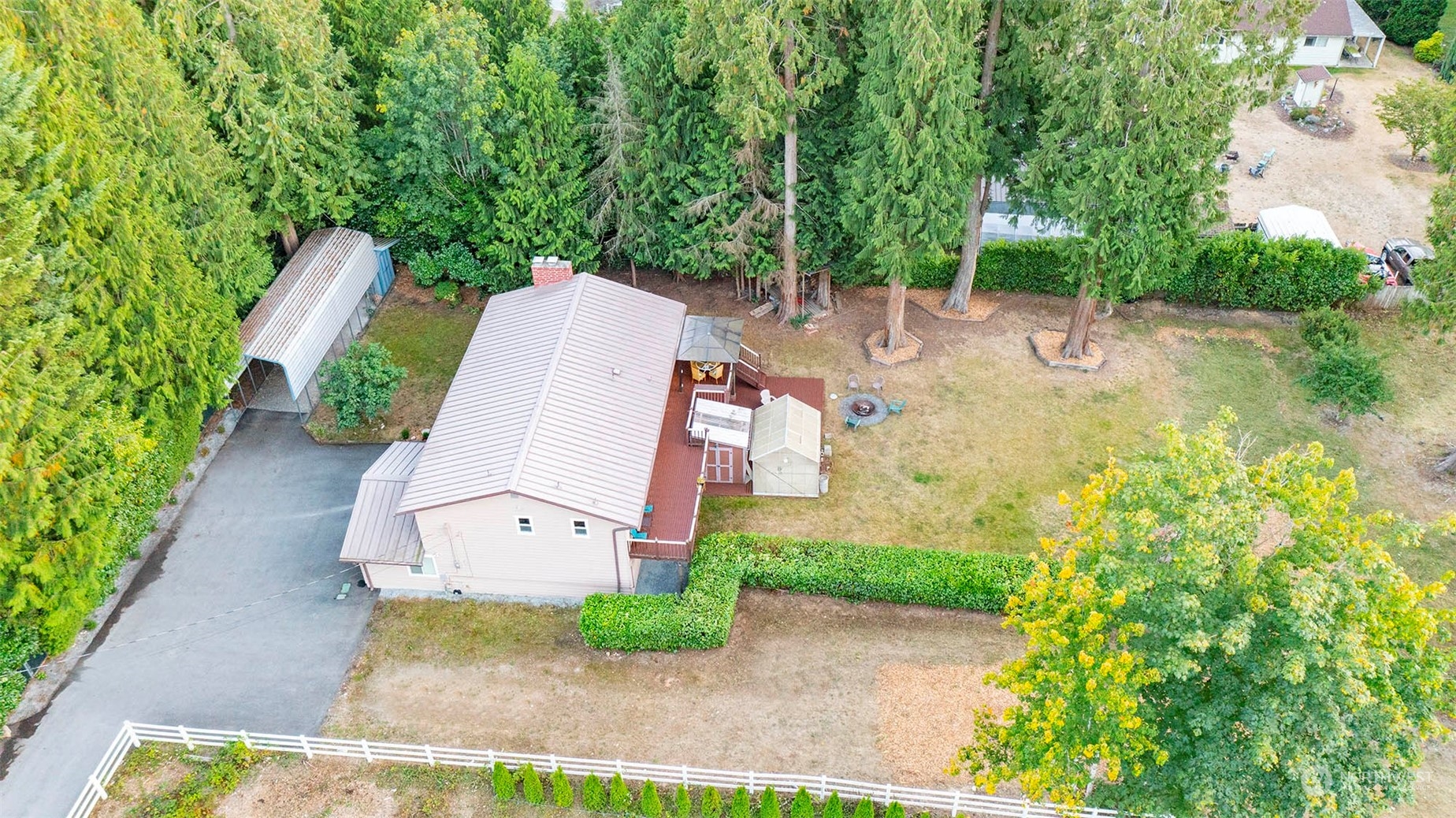 22525 53rd Avenue Southeast Bothell, WA 98021 - Photo 36 of 36 an aerial view of a house with a yard and large trees