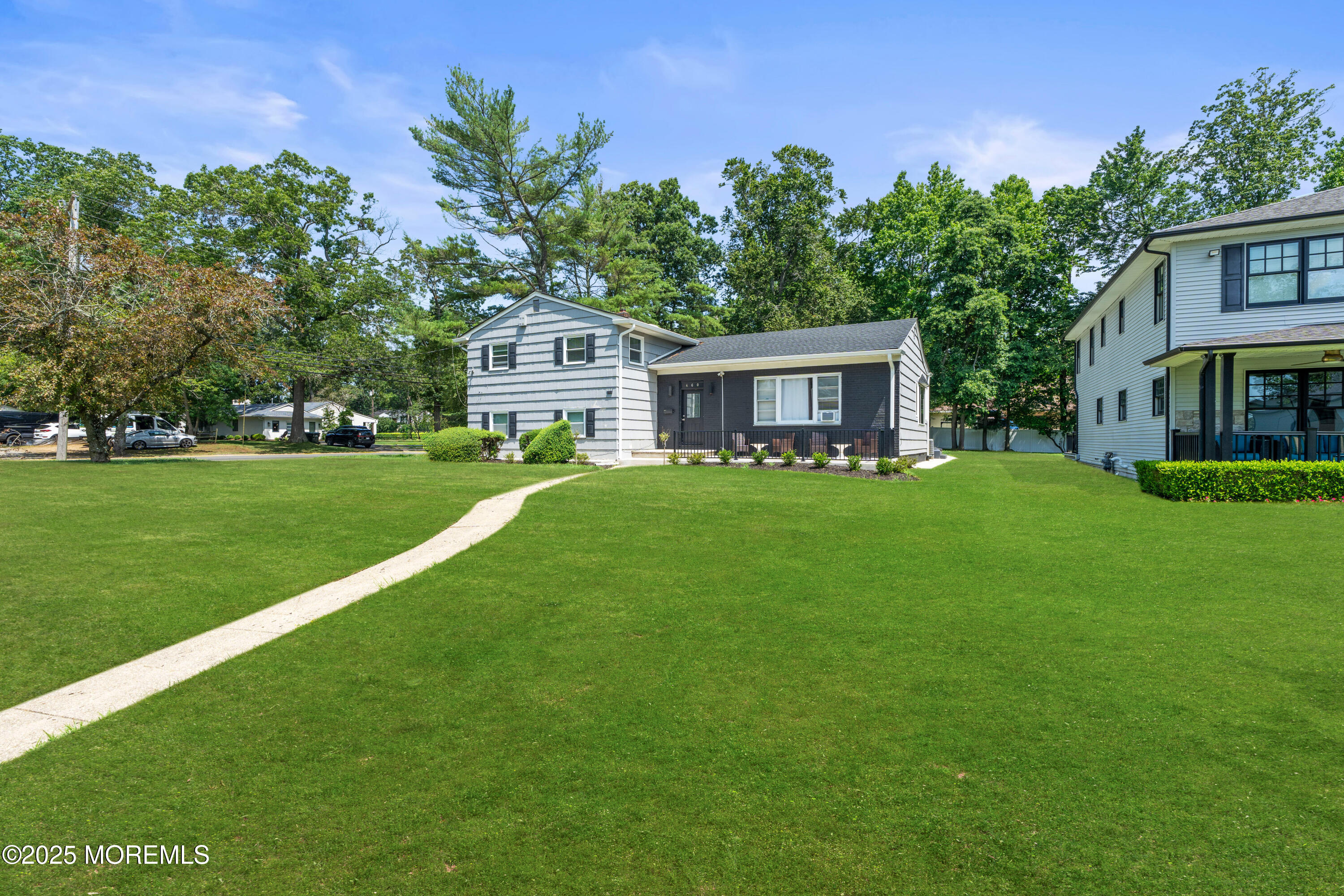 460 Runyan Avenue Deal, NJ 07723 - Photo 1 of 30 a front view of a house with garden