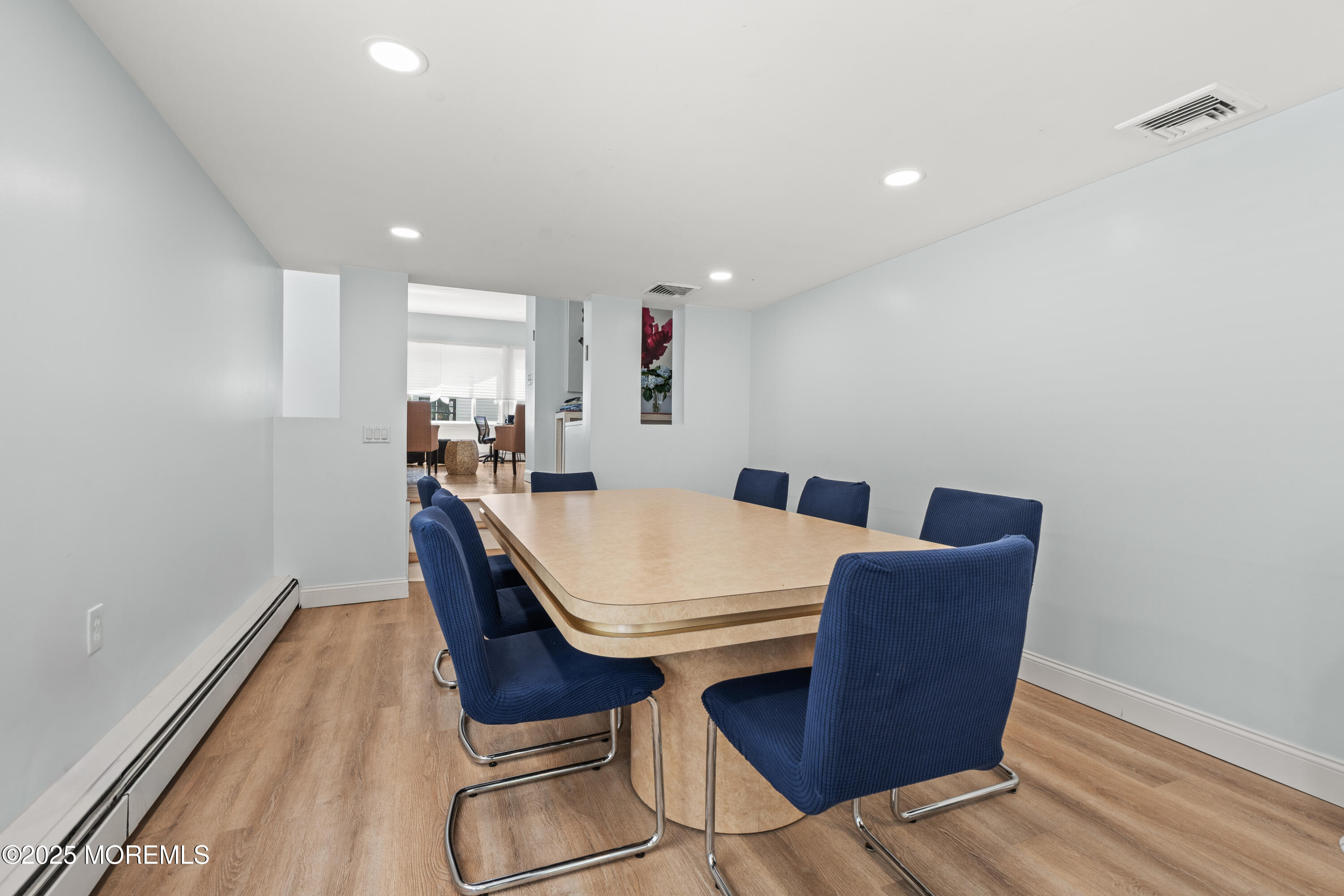 460 Runyan Avenue Deal, NJ 07723 - Photo 17 of 30 a view of a dining room with furniture and wooden floor